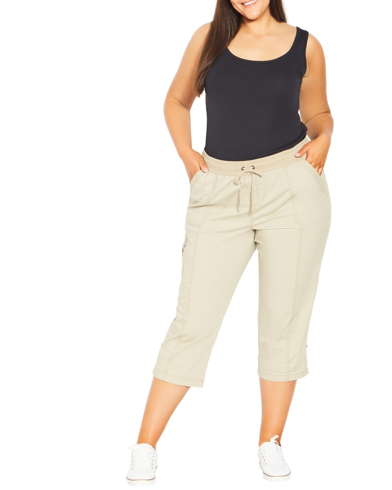 Front of a model wearing a size 18 Sheila Roll Up Capri in Sand by avenue. | dia_product_style_image_id:298654